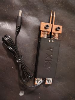 YXXKY Handheld Integrated Spot Welding Pen (with an automatic trigger and dual springs) designed for DIY battery assembly and spot welding