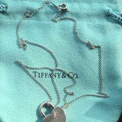 Tiffany & Co Silver XO Hug Kiss Lock Love Charm Pendant in Pouch