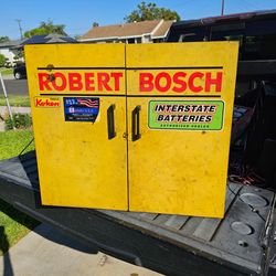 vintage Robert Bosch two-door metal parts and storage cabinet