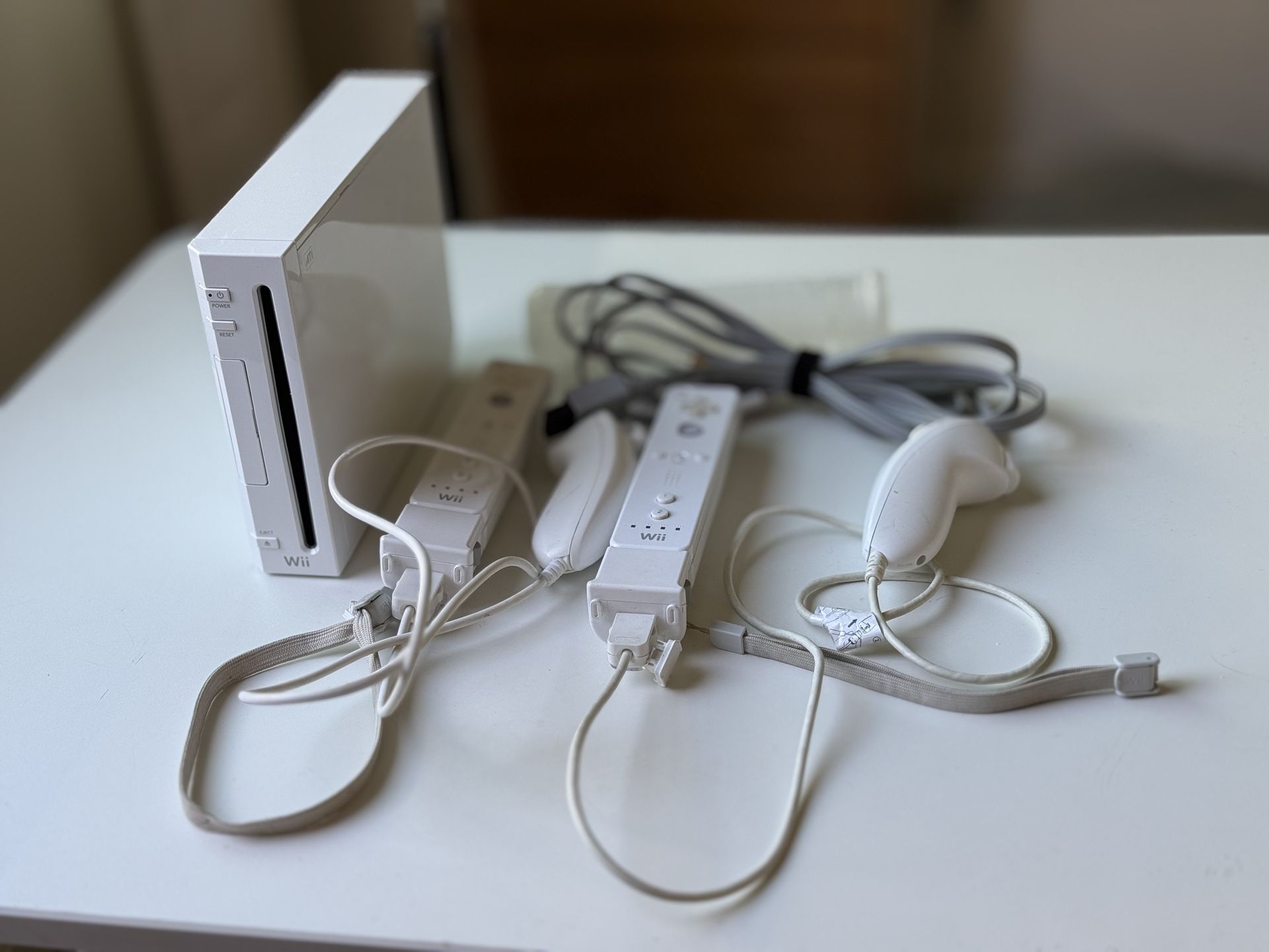 Nintendo Wii Console With Nunchucks
