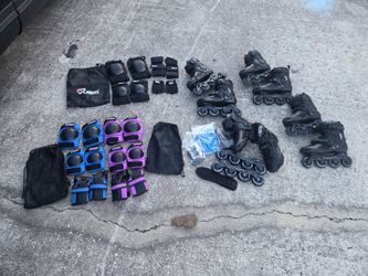 4 sets of Roller Blades and three sets of protective gear
