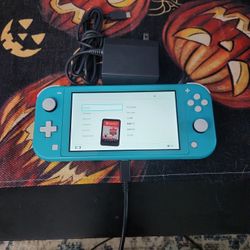 Blue Switch Lite With Pokémon Shield And Ac Addapter