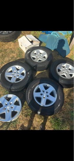 Four Jeep Wrangler Wheels and Tires