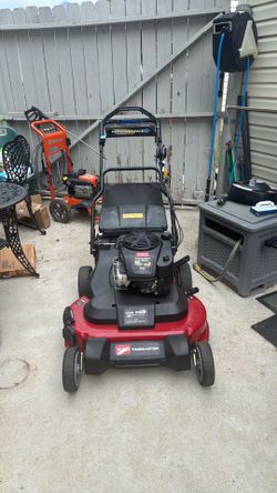TORO® Guaranteed to Start* 10.00 OHV 223cc  DUAL FORCE" TWIN BLADE SYSTEM 30" CUTTING WIDTH