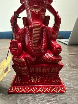 Red Carved Ganesha Statue with Gold Detailing