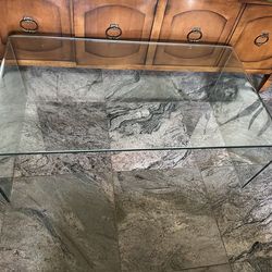Glass table in excellent condition  40” wide 22” side 14” high
