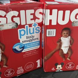 2 Boxes Of Huggies Size 1