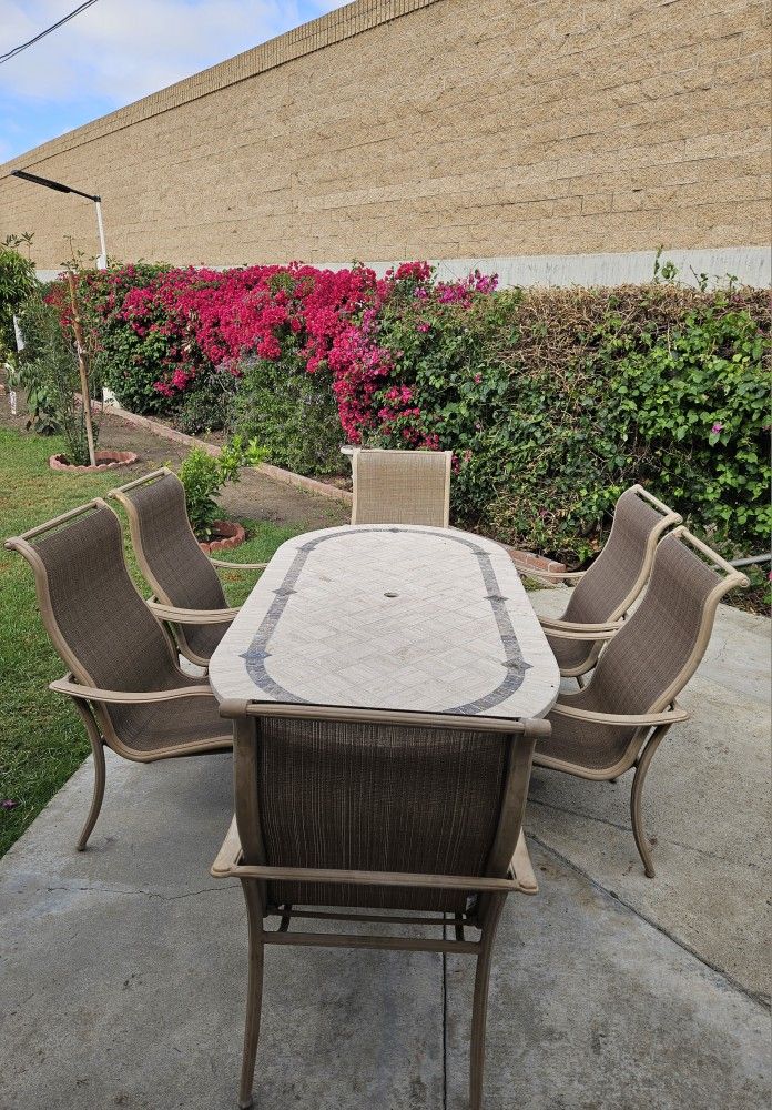 Patio Dining Set,stone Table And 6 Sunbrella Chairs/Outdoor Furniture/Cash Only