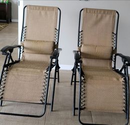 2 zero gravity lounge chairs