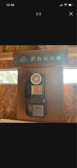 Vintage Rotary Pay Phone with Bell Sign