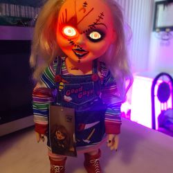 15 inch. Rare Laughing Tiffany Chucky doll in overalls.