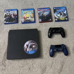 PS4 Slim + 5 Games + 2 Dual Shock Controllers 
