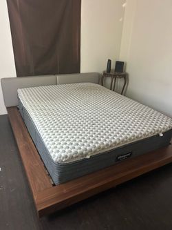 Queen bed frame,mattress and pad.
