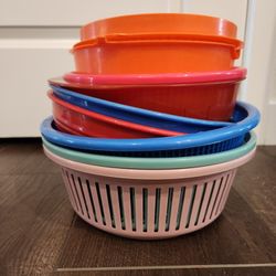 9 Kitchen strainers, colanders, and mixing bowls, Durable plastic in various colors, most of them good  condition 