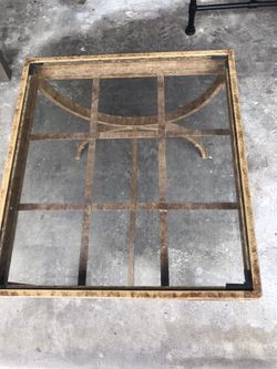Small coffee table22”wide, 24” long , 22” tall with glass