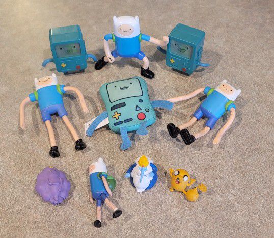 Lot of "Adventure Time" figurines. 

