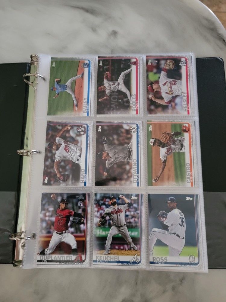 172 assorted baseball cards in black 3 ring binder