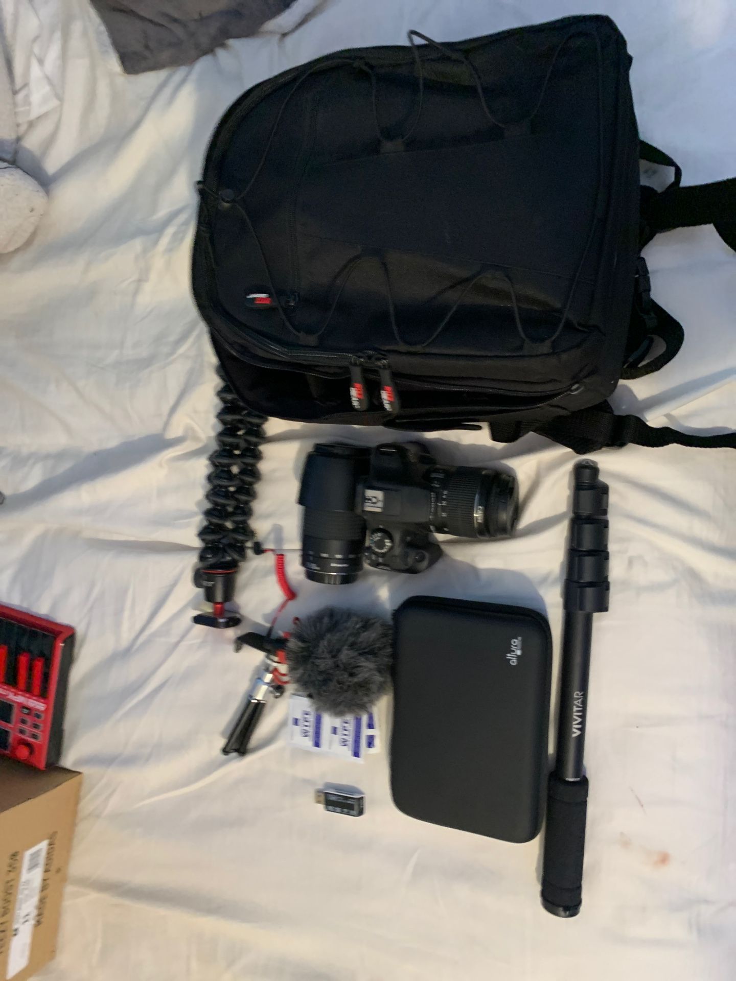 Canon rebel T6 with 2 lenses, rode mic, cleaning kit, tripods, and bag