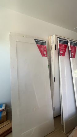 Frameport interior door 28" × 80" door, 1-3/8" thick.