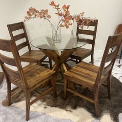 Glass Top, Solid Wood Base Round Table With 4 Matching wood Chairs