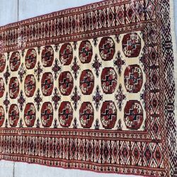 Unique hand made 100 percent wool vintage Persian Turkmen Accent Rug or area rug. 4 x 5. 