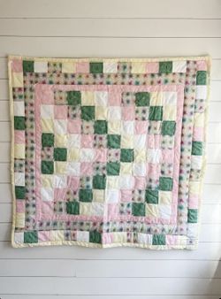 Handmade baby crib quilt green, yellow, white, and pink 39in by 42in