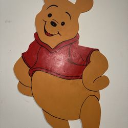 una decoración de pared de madera hecha a manoWinnie the Pooh