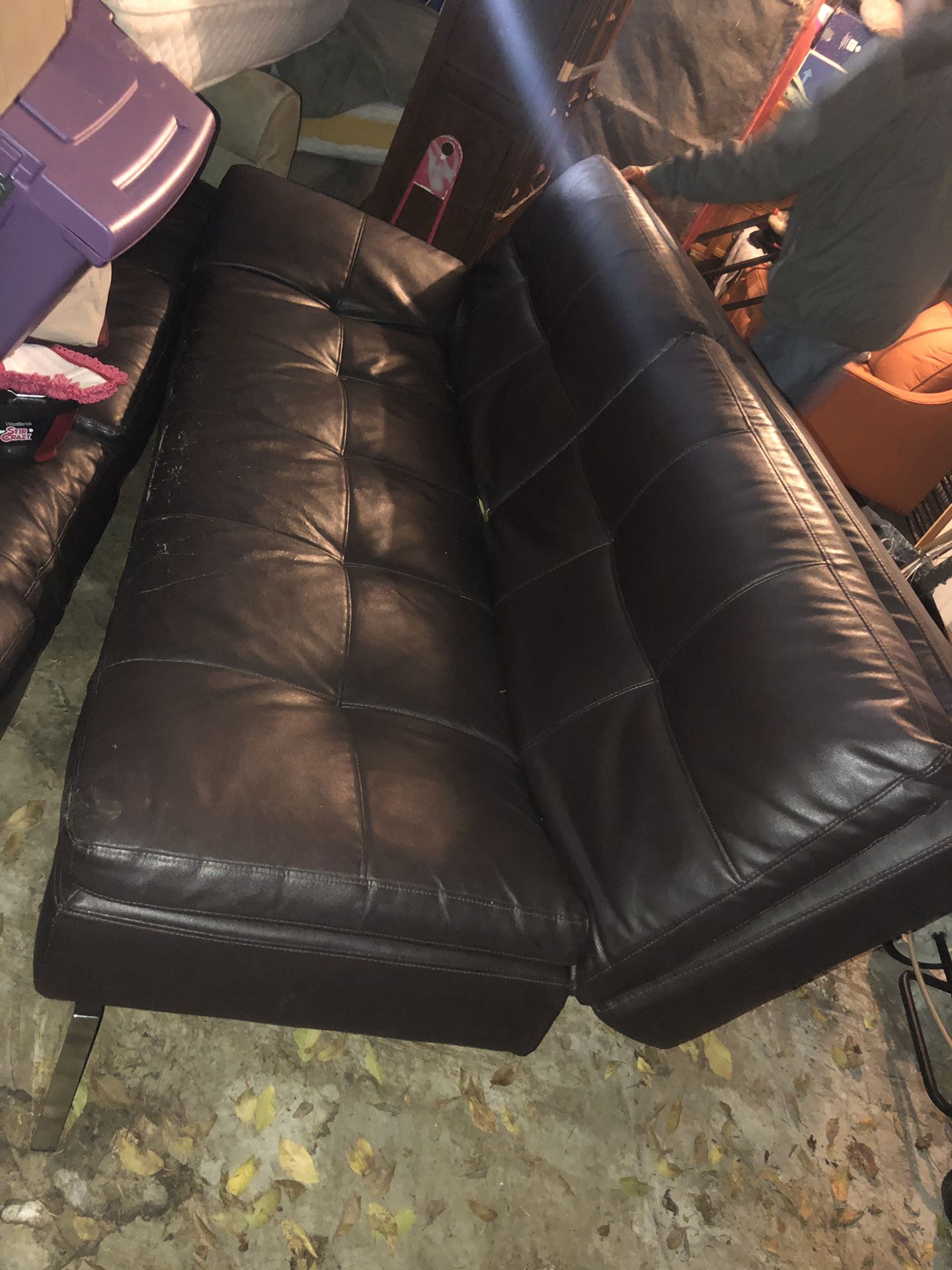 IKEA nice black leather sleeper sofa,flattens into a bed,chic chrome legs