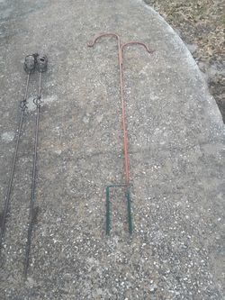 Plant Hanger & 2 TIKI TOURCHES.  PLANT HANGER 10.00 & $10.00 FOR BOTH TIKI TOURCHES.  Ok Condition PICKUP ONLY