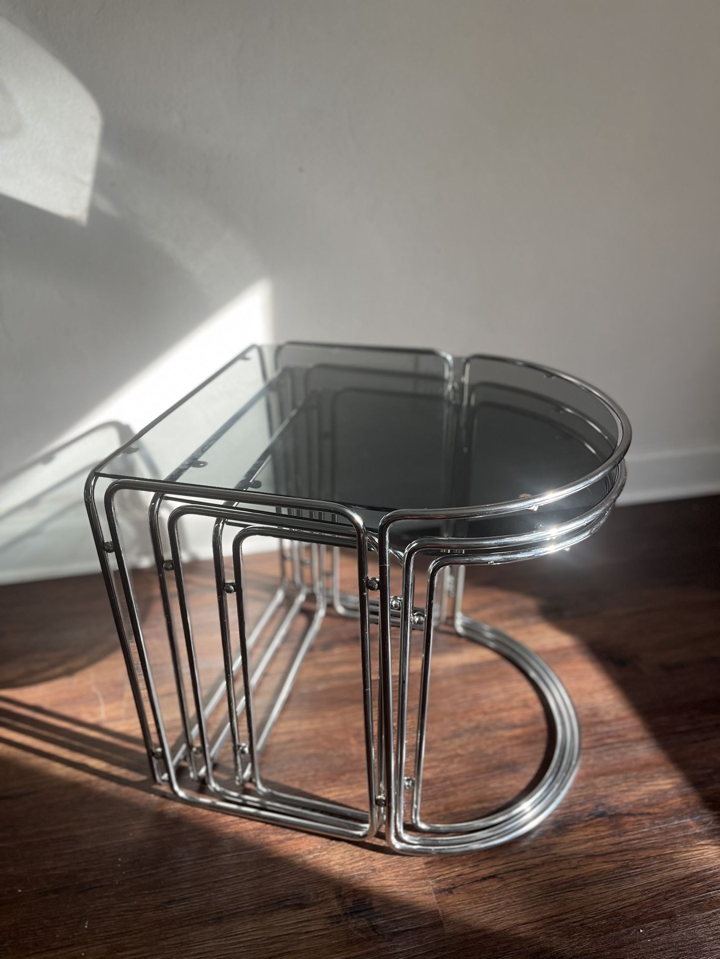 Set of vintage Mid-Century Modern chrome and smoked glass nesting tables