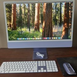 Purple Apple IMac M1 24” with Apple mouse and keyboard