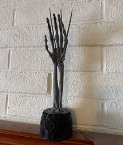 Wolverine Skeleton Hand Statue