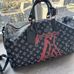 100% Authentic Louis Vuitton Duffle Bag