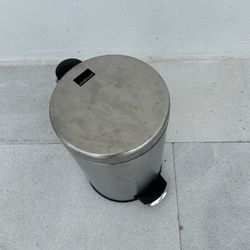 Small metal trashcan