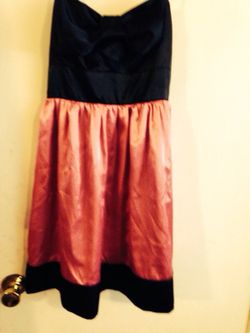 Bright pink and black bow dress