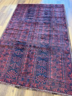 Hand knotted wool bellochi rug
