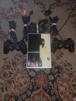 PlayStation  2 with Two controllers