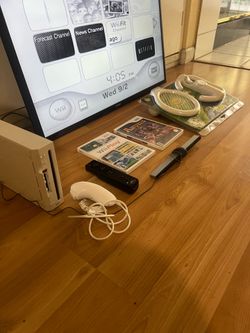 Nintendo Wii Console Bundle - Remote, Nunchuk, Sensor Bar, 2 Games & Sports Pack