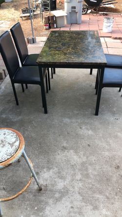 Dinner table L 48” W 30” H 30 1/2” with 4 chairs