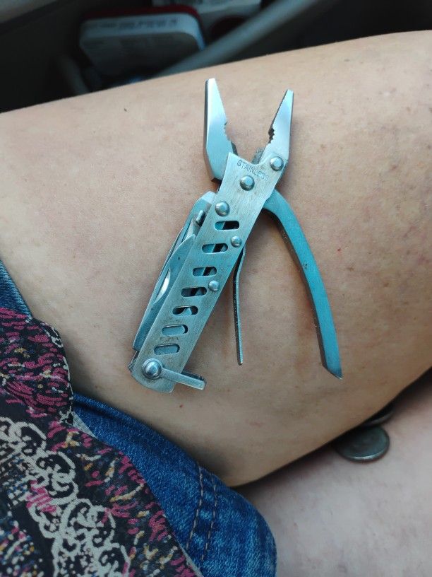 Many Tool Multi Tool In Like New Condition With Plyers On The End