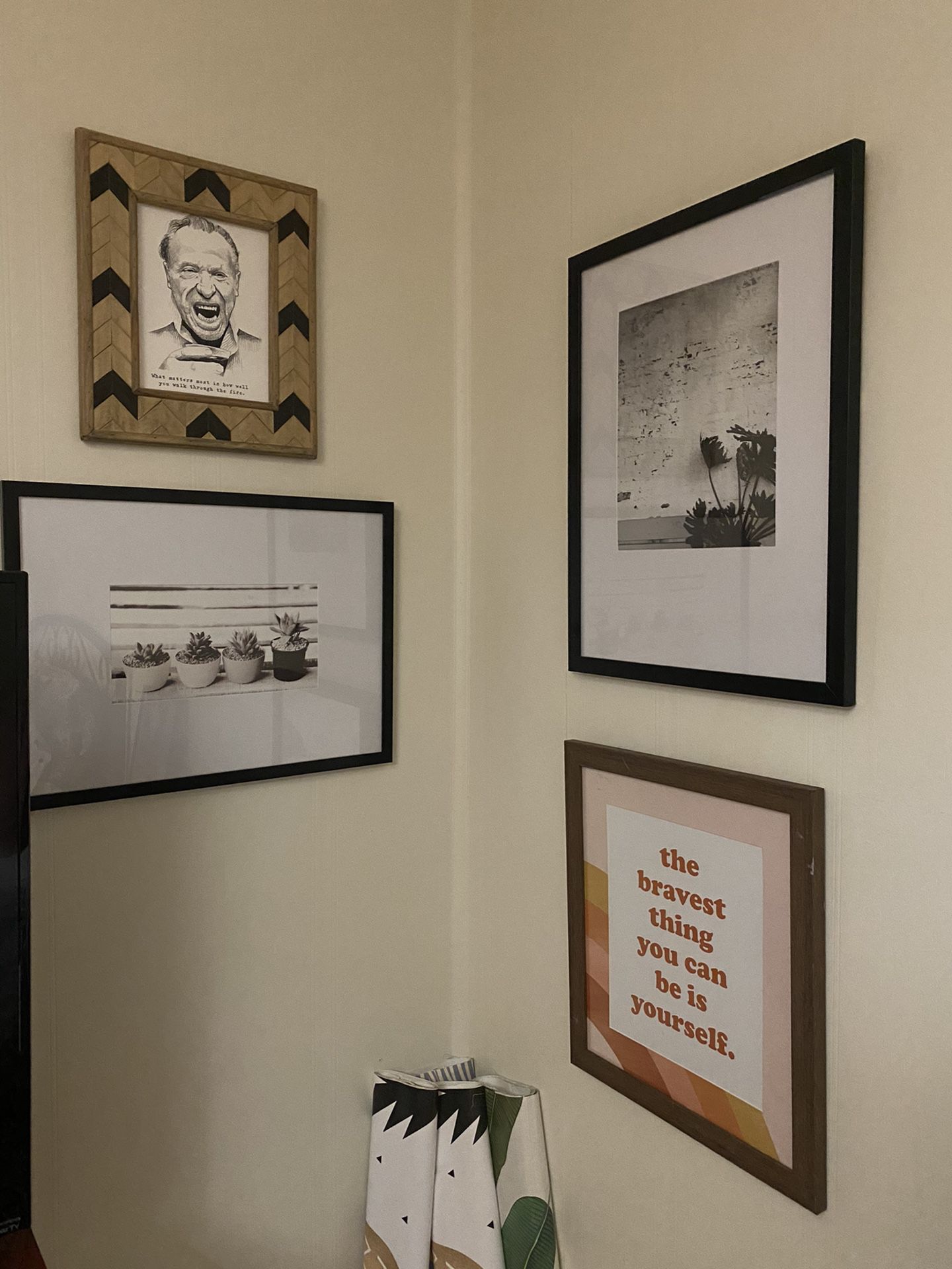 2 black and white framed pictures
