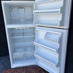 White refrigerator top freezer and fridge