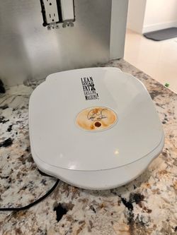 Lean mean fat grilling machine kitchen panini press