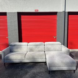 MODERN GREY FABRIC SECTIONAL COUCH/ 2 PIECES/ HEADRESTS ARE ADJUSTABLE/ IN GOOD CONDITION/ DELIVERY NEGOTIABLE 