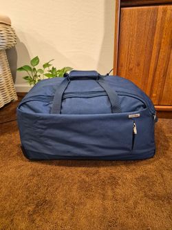 Samsonite Checked In Travel Luggage Suitcase wheeled duffle bag 24"
