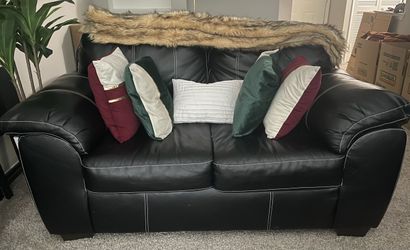 MUST GO BY SEPT 12 Black leather love seat