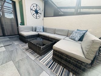 Outdoor furniture set with table and cover