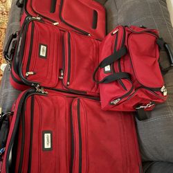 4-piece red softside luggage set by Chaps (a Ralph Lauren diffusion brand)