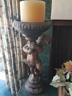 Vintage Statue Carrying Big Candle