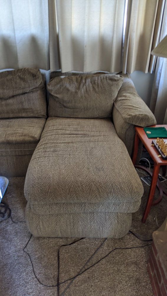 Amazing LaZBoy sectional couch with recliner and hideaway bed.